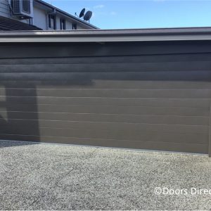 Tuscan Sectional Door Jasper with matching steel work
