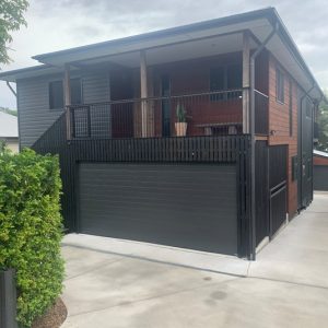 Tuscan Monument Sectional Door under house
