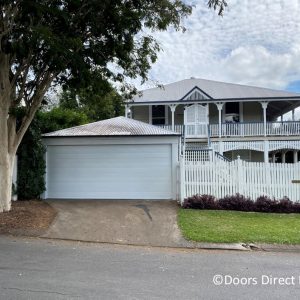 Dover White Tuscan Sectional Door to Carport