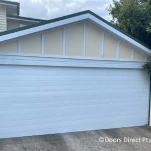Dover White Tuscan Sectional Door with Hinged Taper