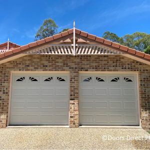 Oxford Sectional Doors with Sundburst Windows Surfmist