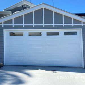 Hampton Sectional Door Dover White with Traditional Clear Windows Hinged Taper Panel JUL 21