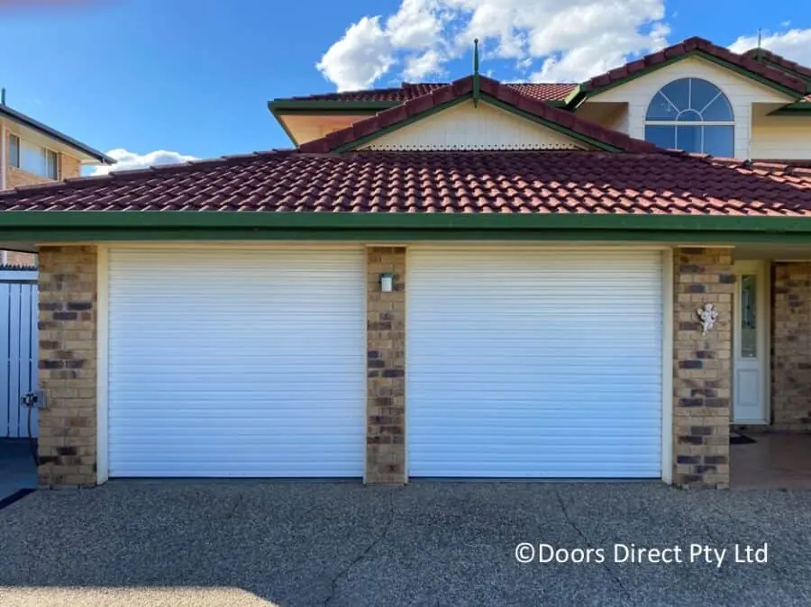 Dover White Colorbond roller garage doors on a Brisbane home